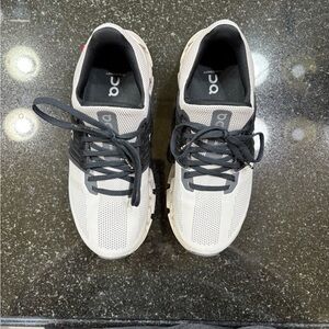 On Cloud Black and Cream Athletic Shoes Sleek Design